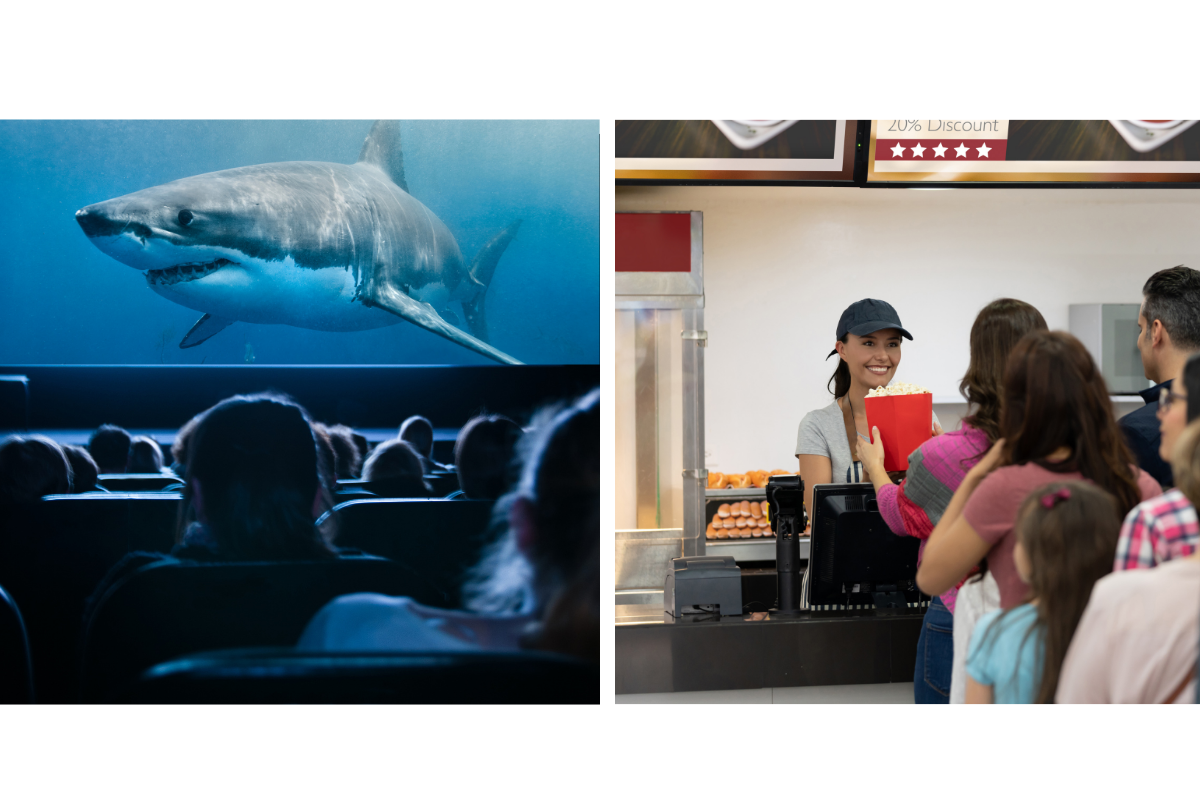 shark on movie screen and people in concessions line